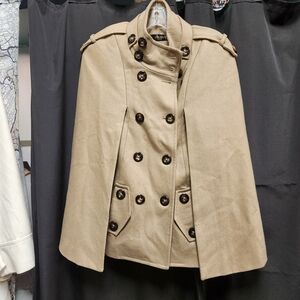 Camel cape with lots of buttons.